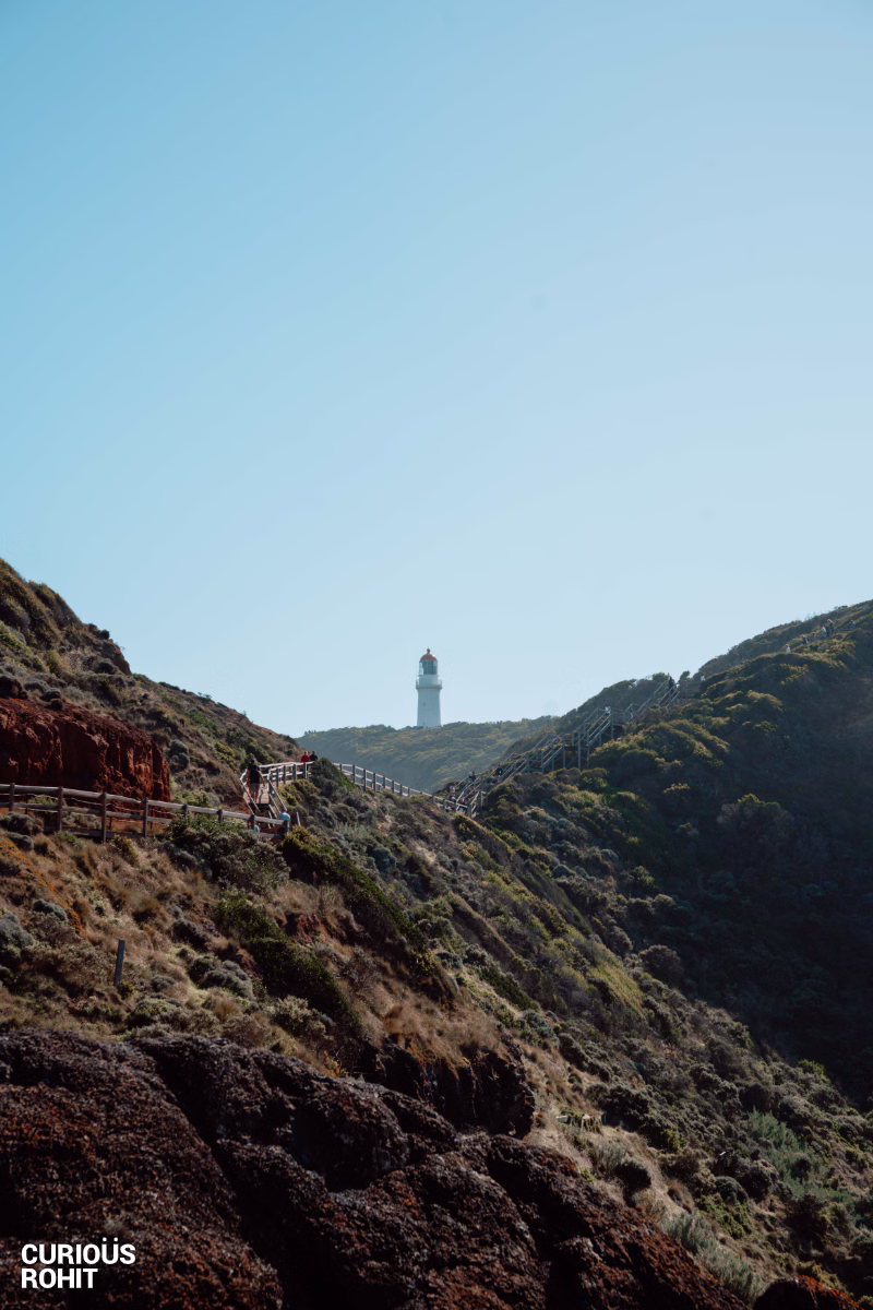 A lighthouse on a hill